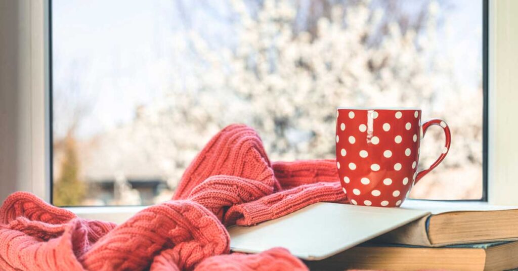 A red sweater and cup