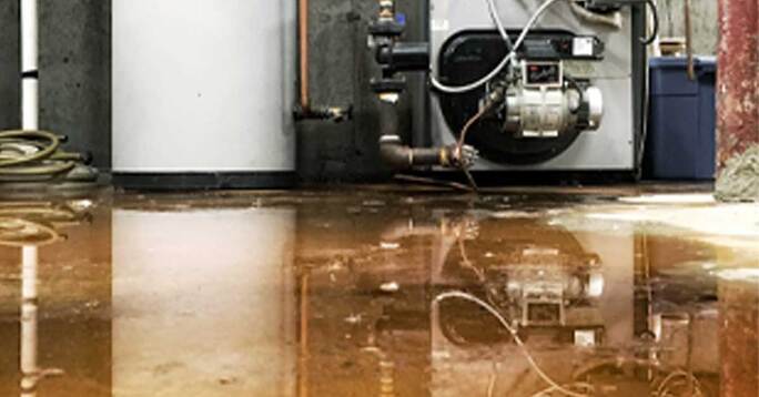 A close-up image of a leaking oil tank.