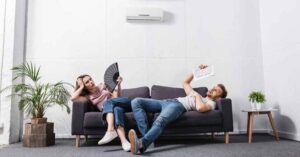 Two people who are sweating in their home.